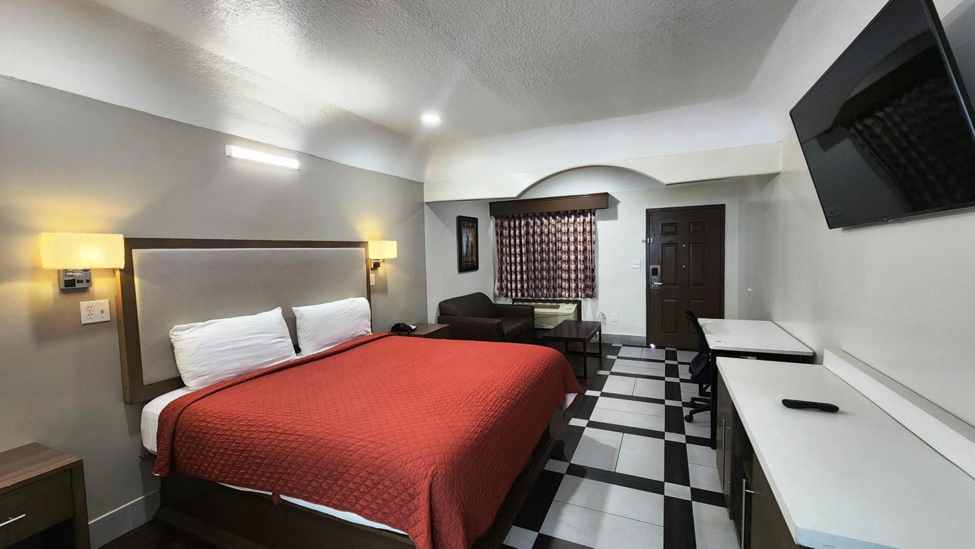 Scottish Inn & Suites Sam Houston Parkway Exterior foto